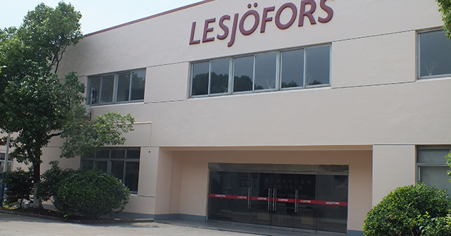 Exterior of the Lesjöfors China facility with the Lesjöfors sign on the building.