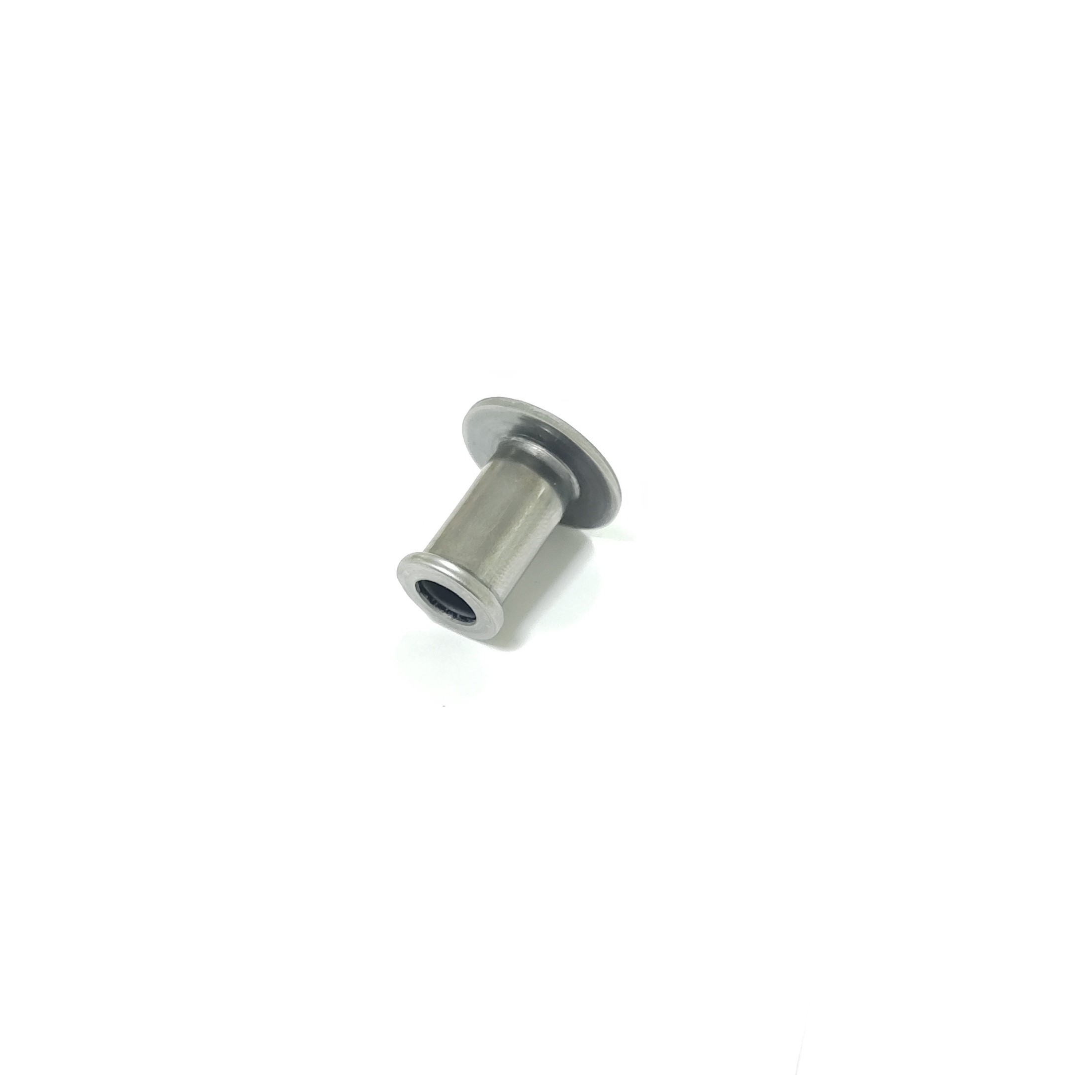 A small silver metal deep drawn part is centered on a plain white background, highlighting its simplicity and industrial design.